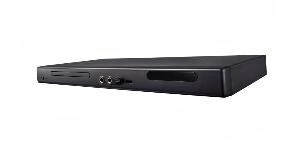 A side-angle view of a slim, black Digital Video Recorder (DVR) unit with front-facing USB and audio ports, serving as the hub for CCTV equipment